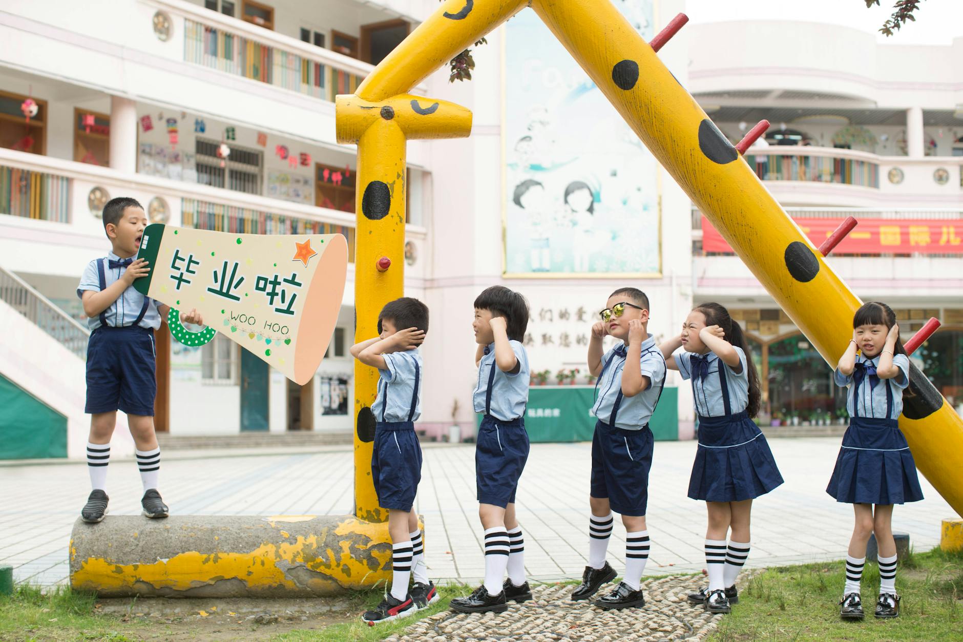 Middle school students working in a community garden, planting seedlings together during an after-school program.
