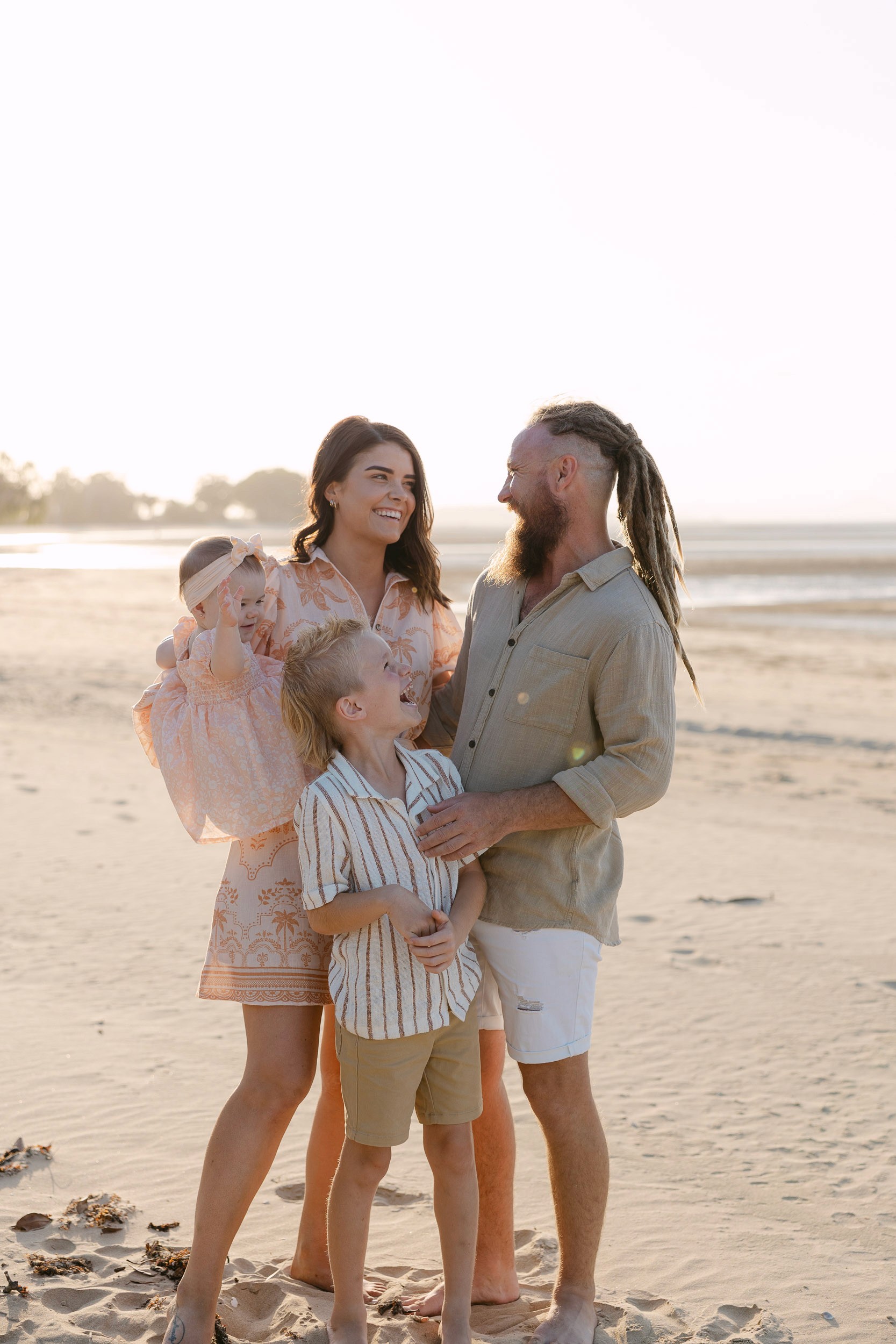 A relaxed family spending time together by the ocean
