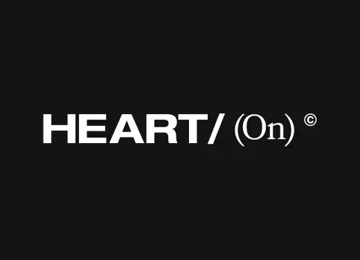 HEART/(On) apparel brand logo in bold white text on a black background, emphasizing the custom typography.
