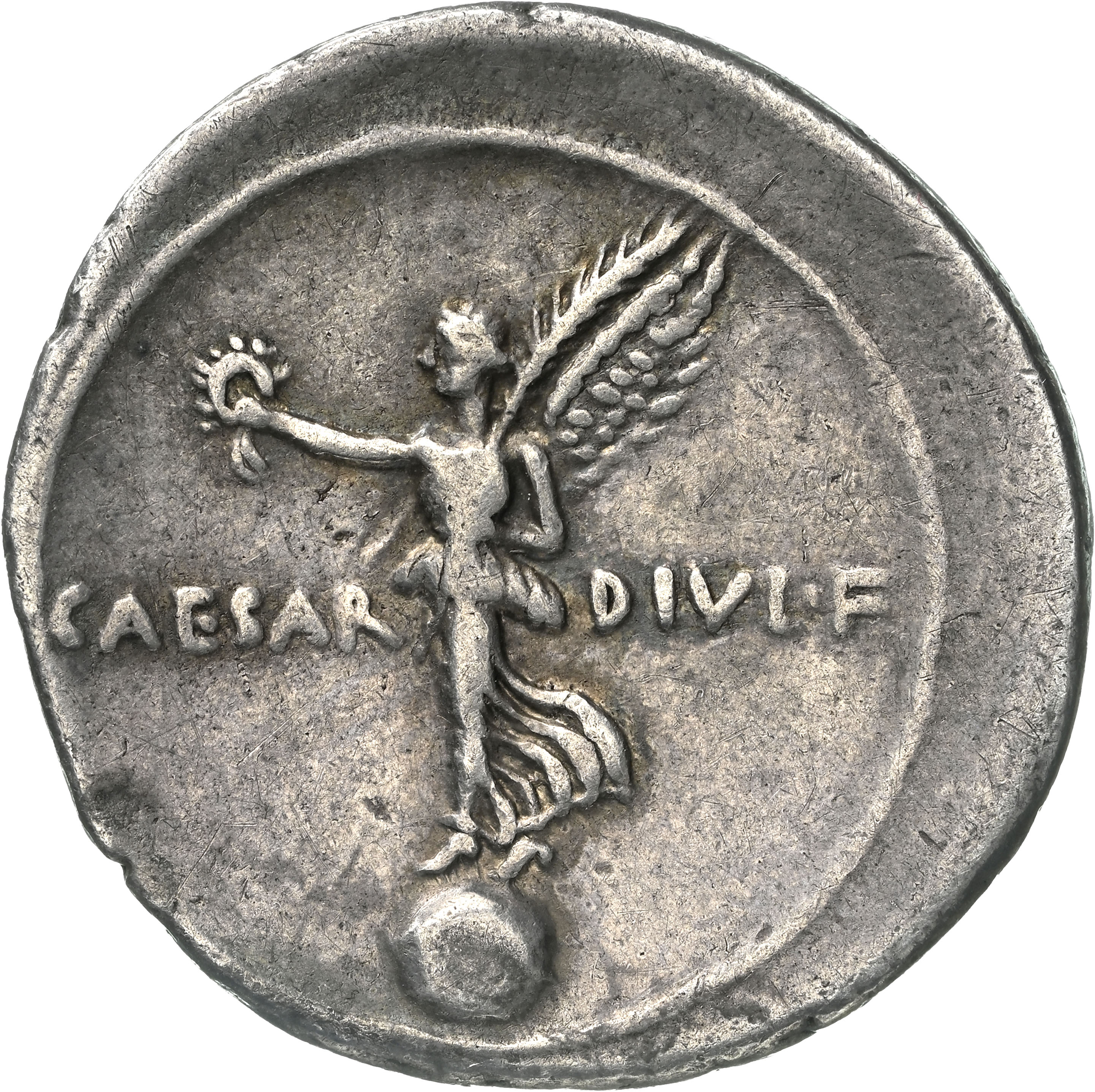 Octavian denarius reverse showing Victory on a globe.