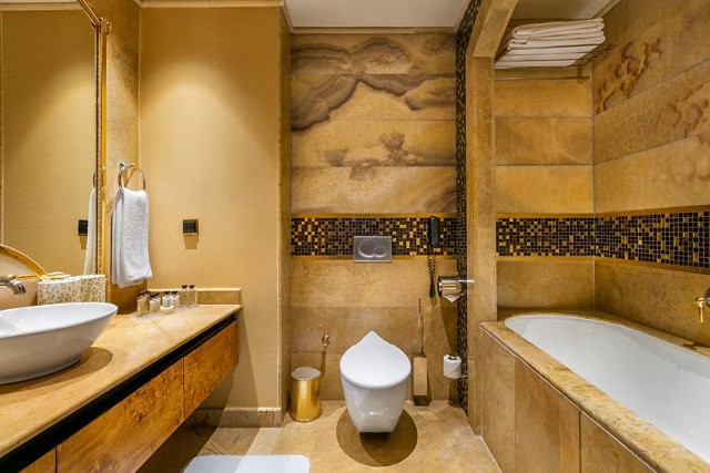 The spacious bathroom with a full bath, premium amenities, and daily housekeeping ensures consistent freshness.