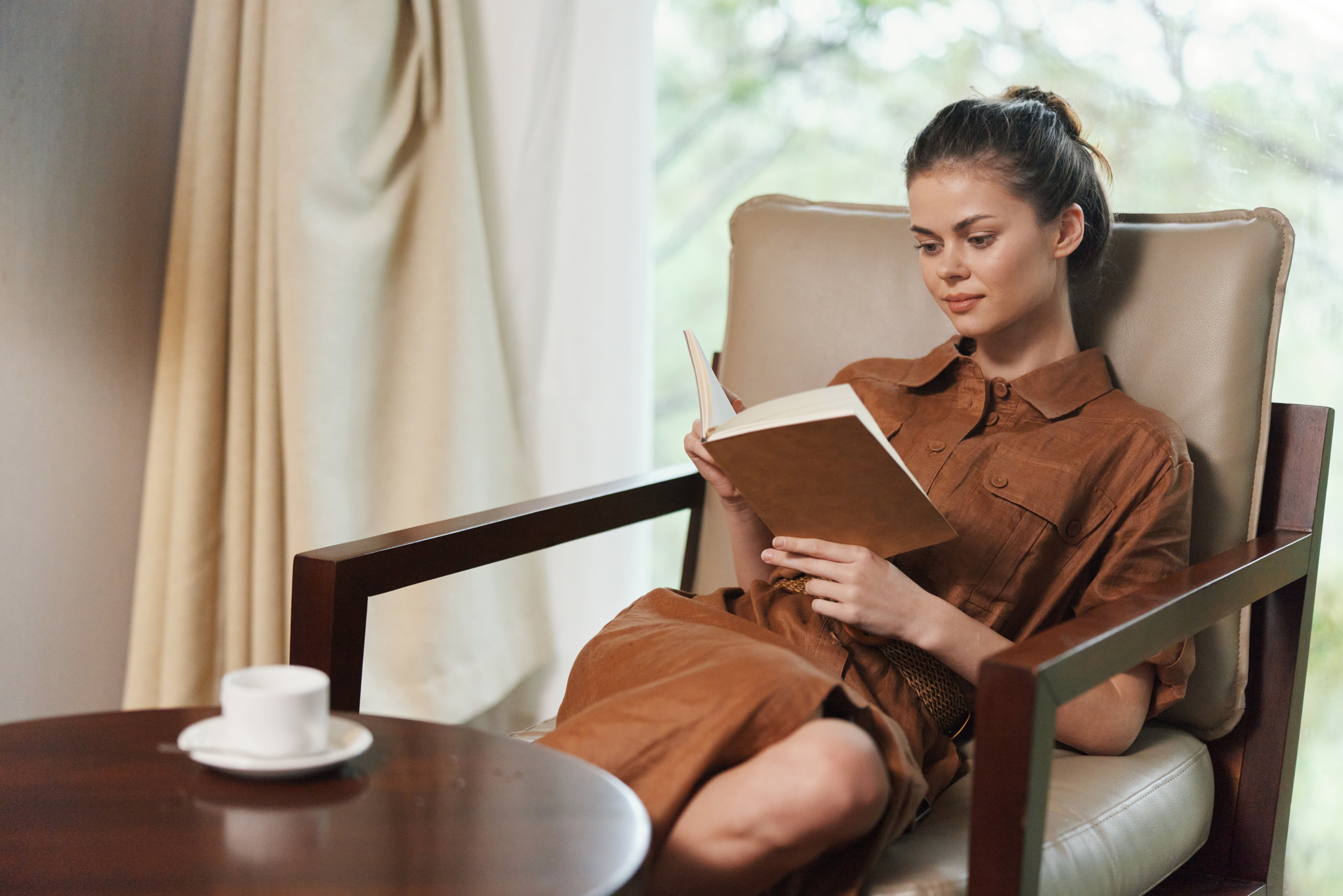 woman reading a book indoor