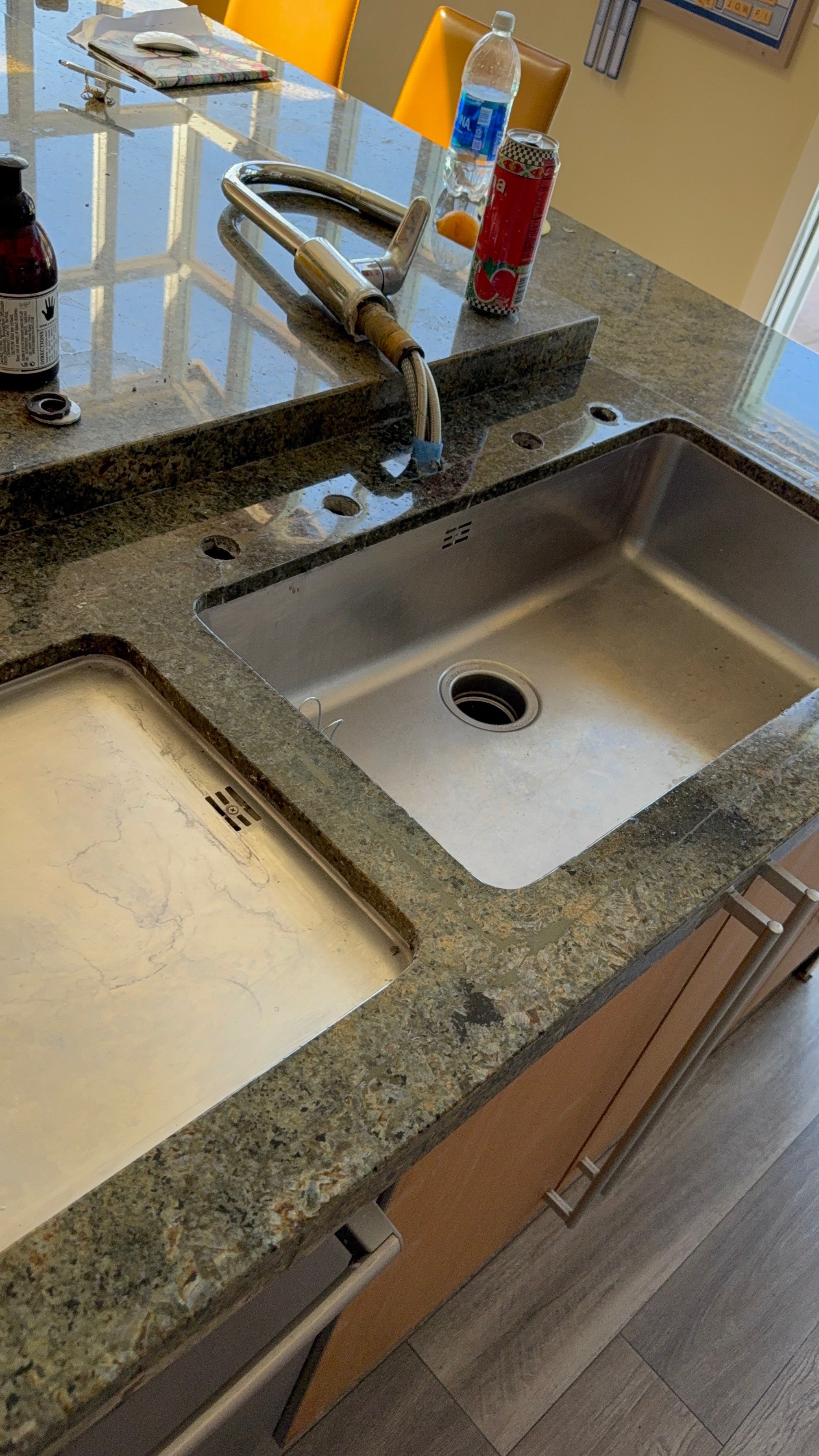 Stone sink and countertop repaired and refinished.