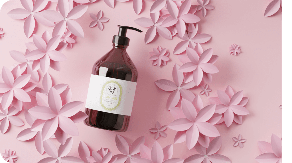Overhead packshot of Ginger soap on pink surface with flower decoration
