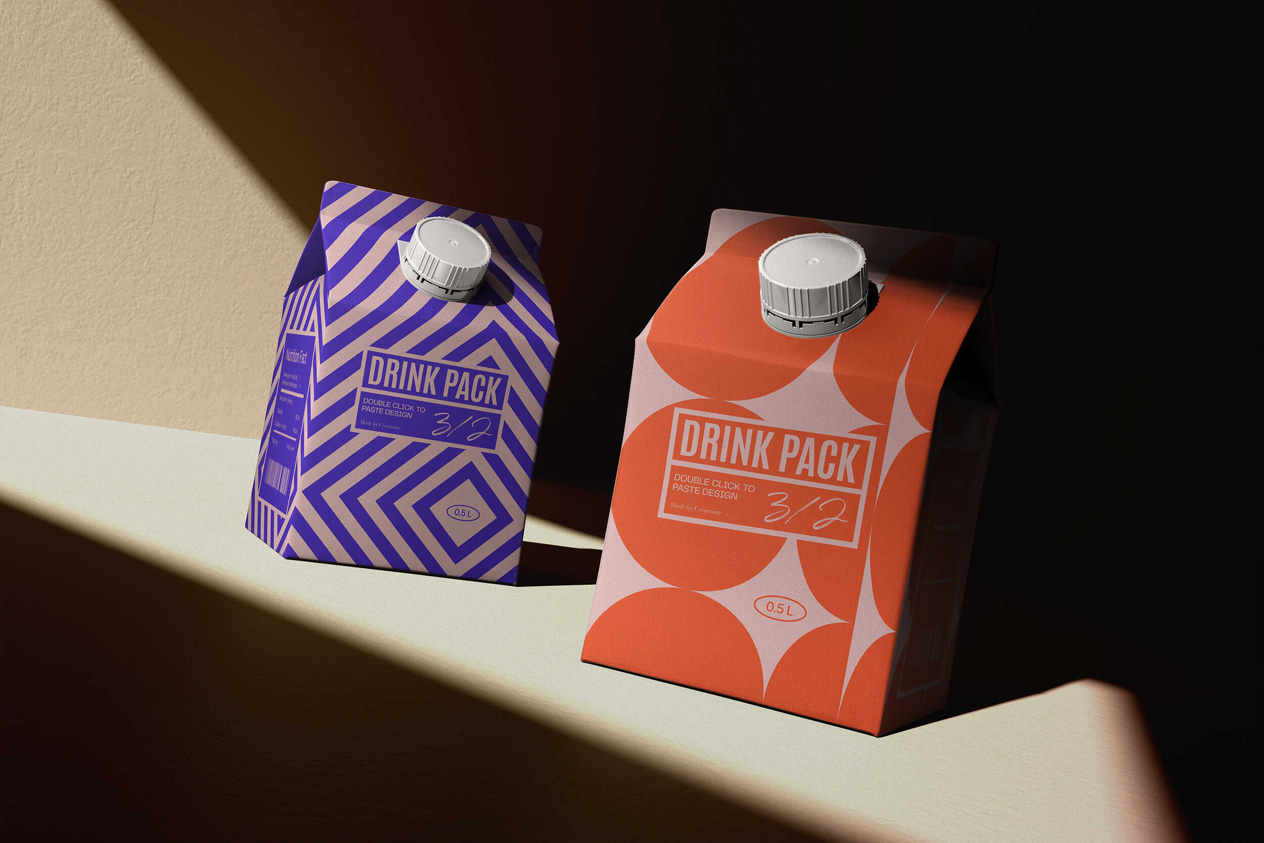 Two drink cartons in spotlight with geometric patterns