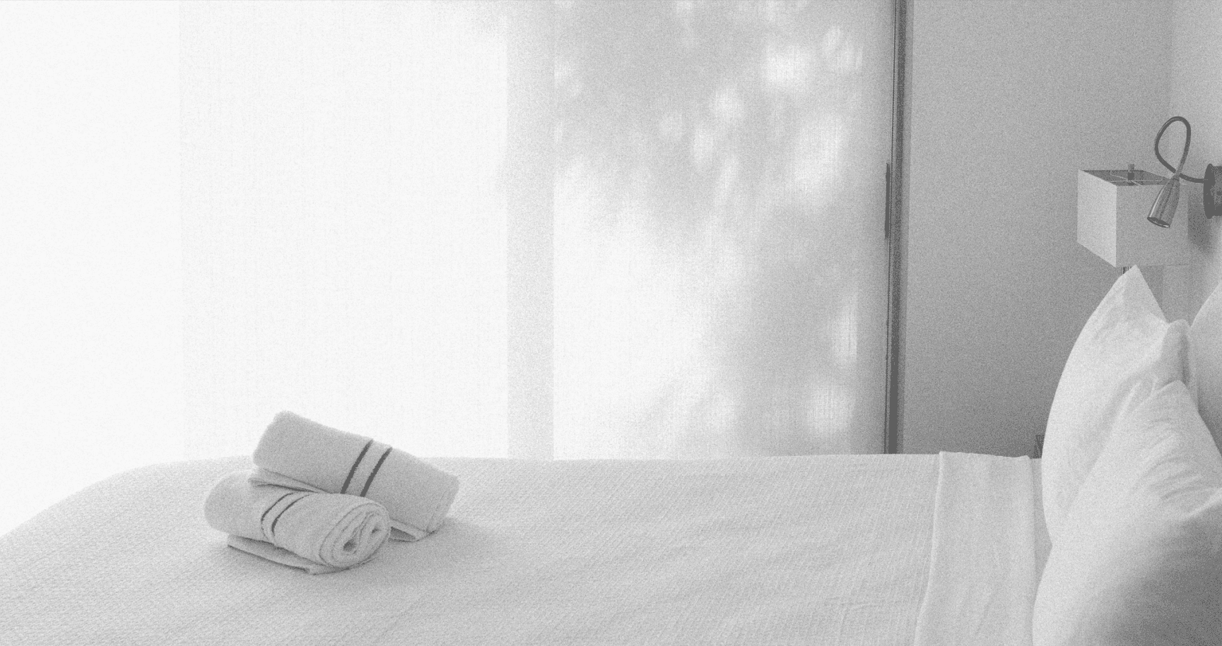 bedroom with minimalist decor, blending style and comfort in contemporary Key West lodging