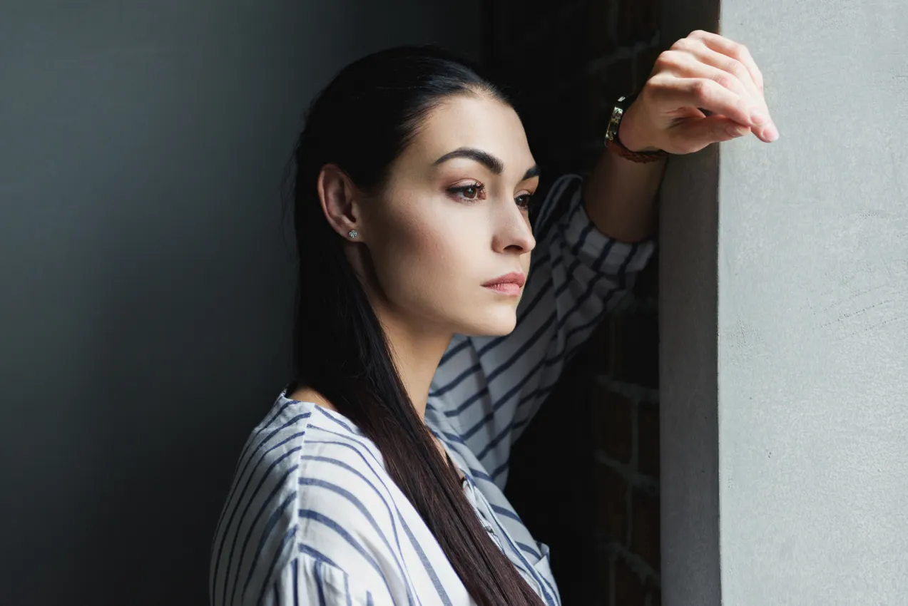 woman looking out of window long black - large