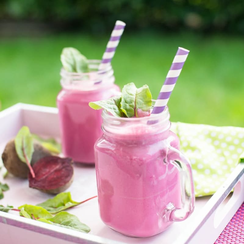 beetroot smoothies sitting on a tray