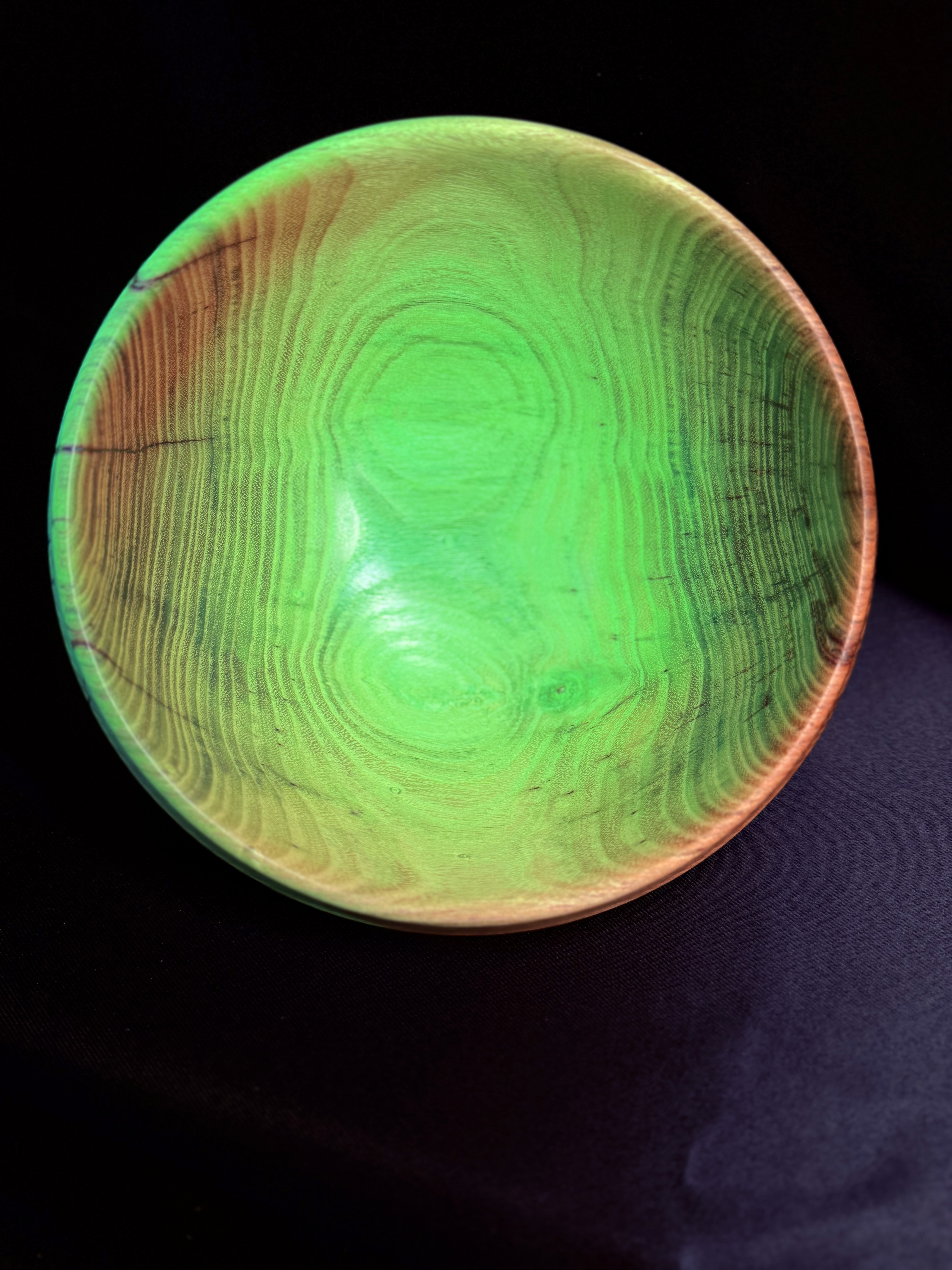 Glowing Locust Bowl shown under ultraviolet light.