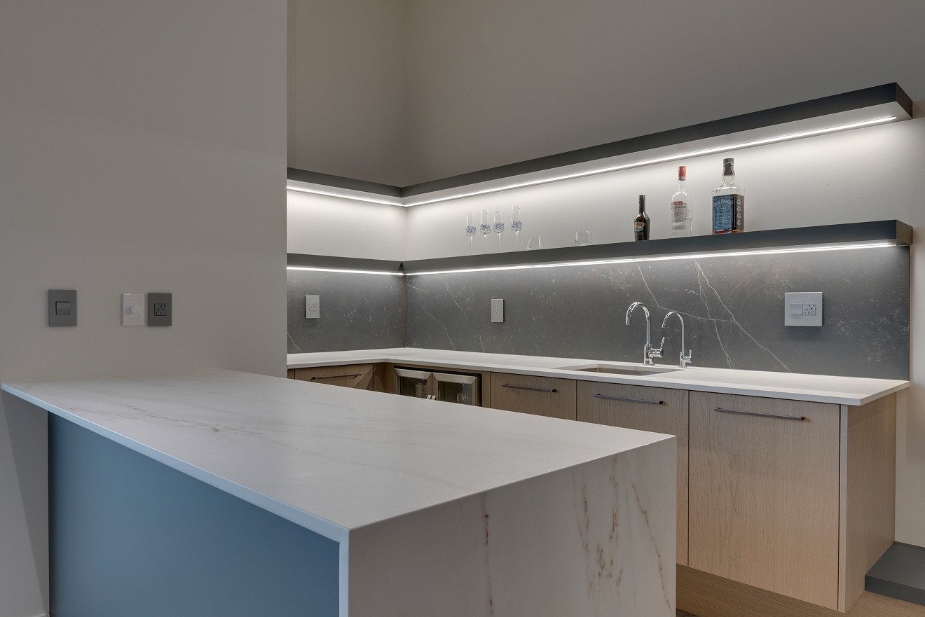 Custom staircase and upper landing with modern railing