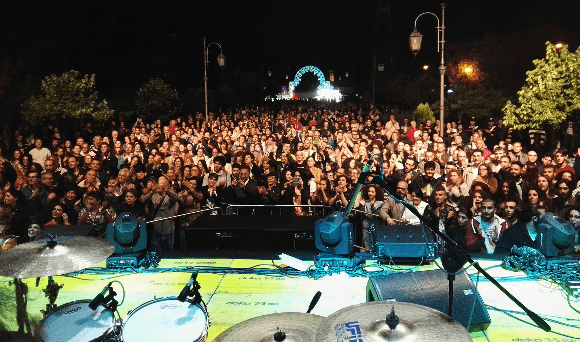 Woman near microphone in recording studio