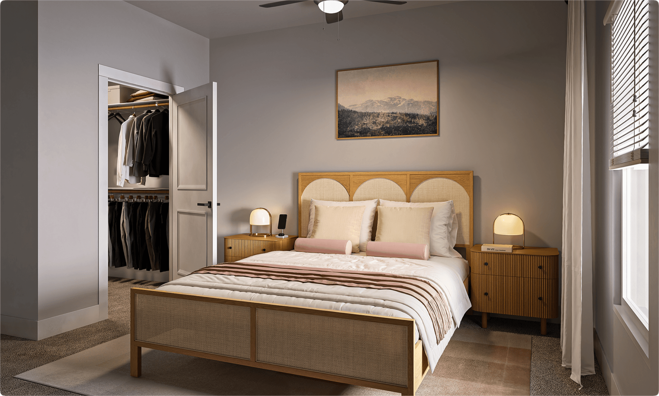 Modern master bedroom at Renza apartments in Charlotte featuring walk-in closet and designer lighting.