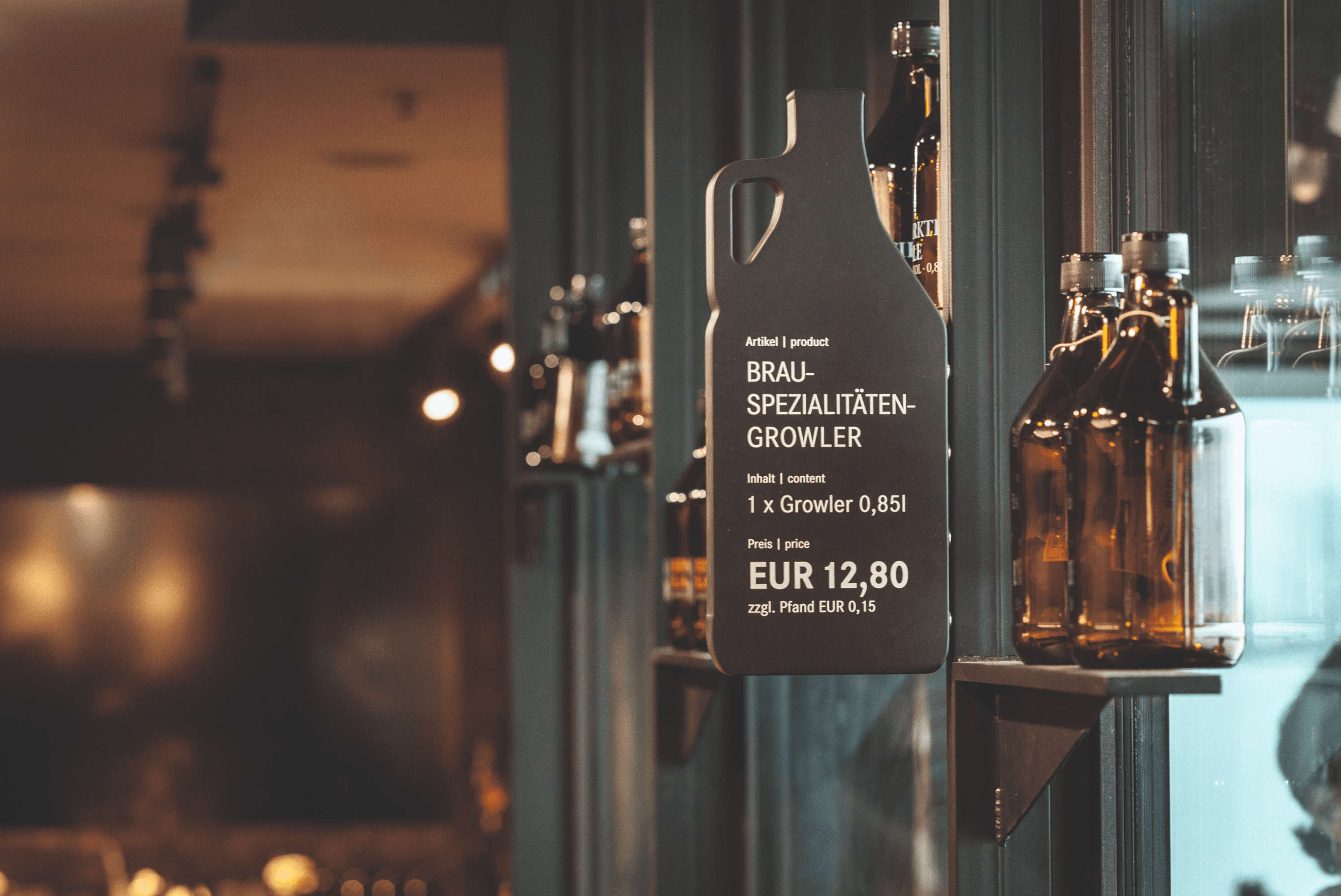 Growler price tag with beer bottles