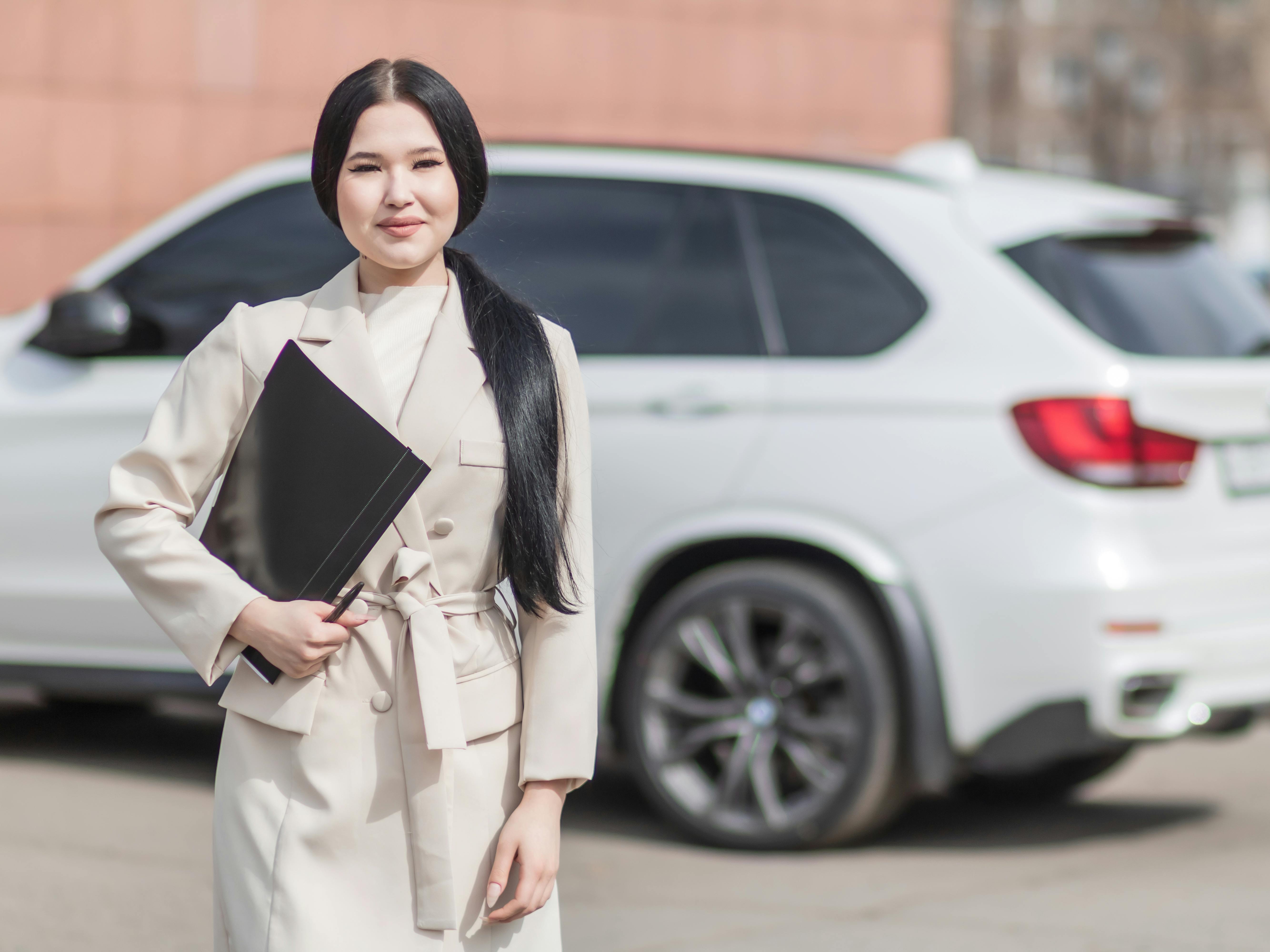 Successful mortgage broker holding black folder