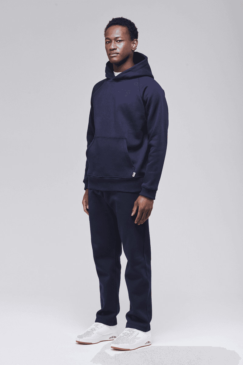 Angled front view, classic fit hoodie in heavyweight cotton blend