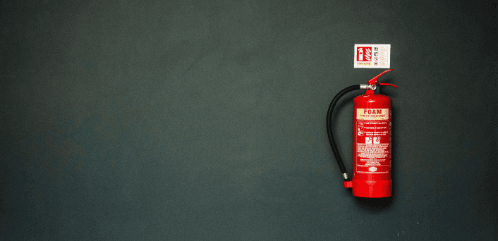 Fire extinguisher mounted on a wall.