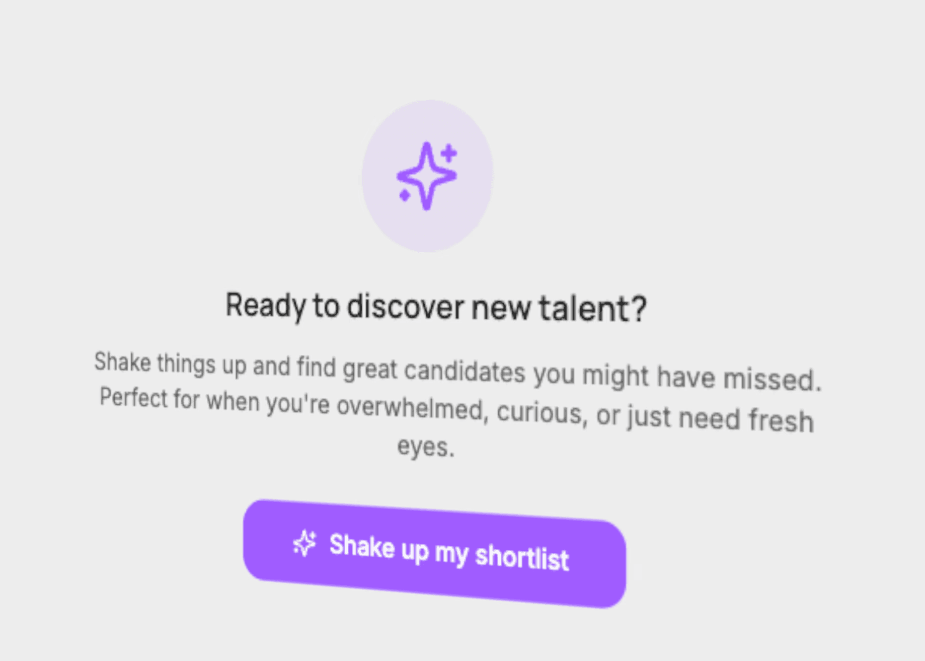 A smiling man wearing glasses in an office setting.