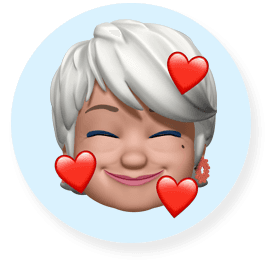 Smiling Memoji face - an older woman with short, white hair