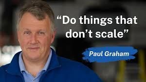 a black and white living room with a large tv