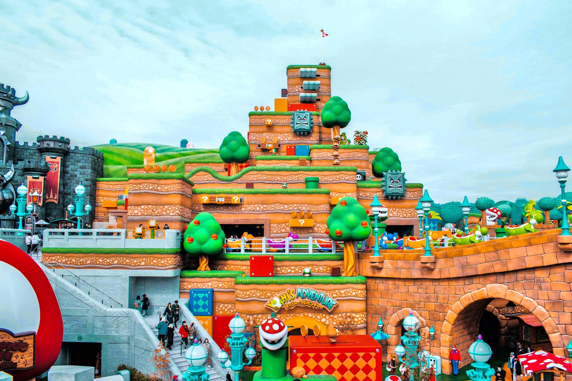 brown and white temple surrounded by green trees during daytime
