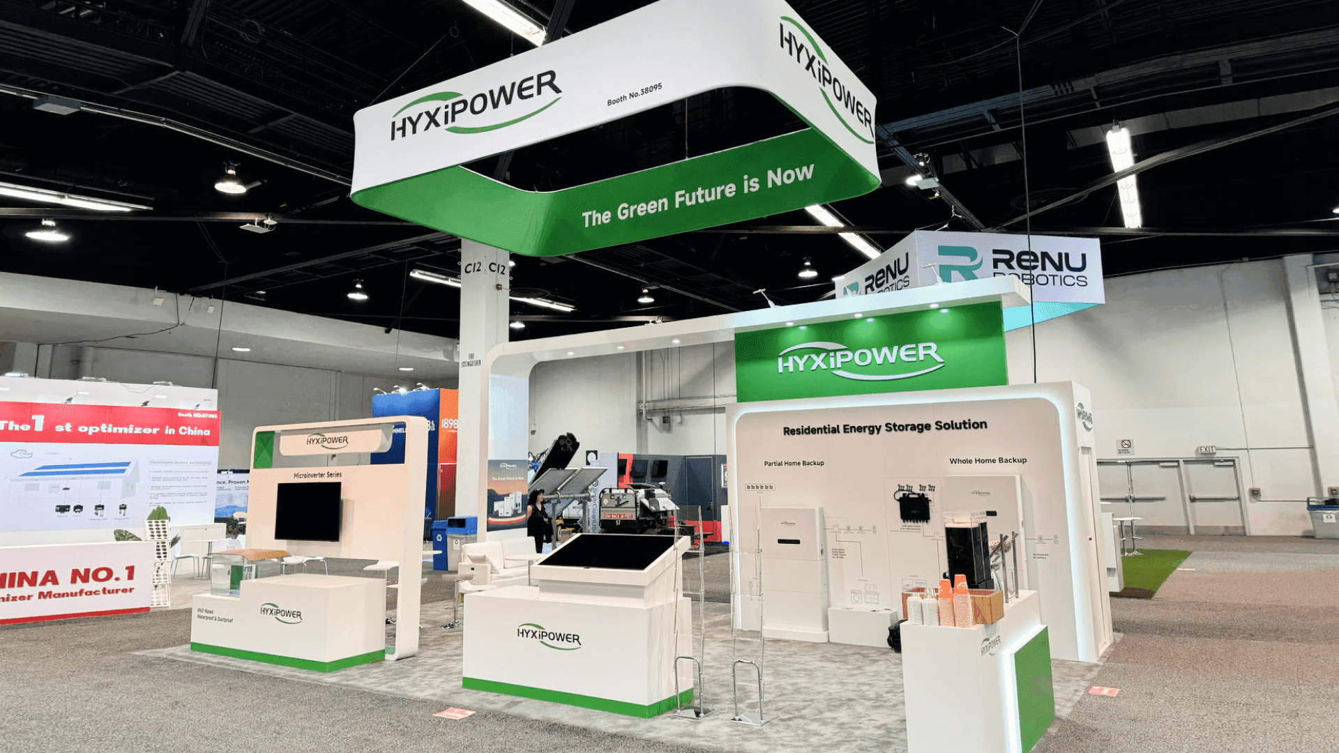HyxiPower hanging sign above 20x30 booth highlighting clean energy branding at RE+ 2024.