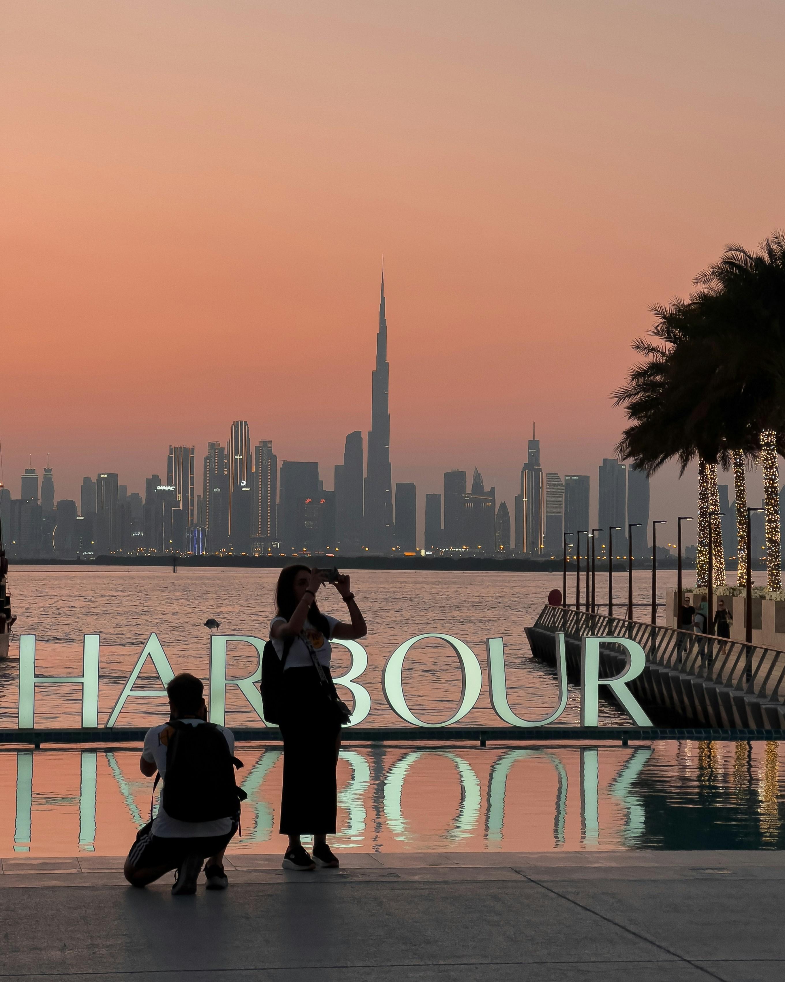 An aerial view of a city and a body of water