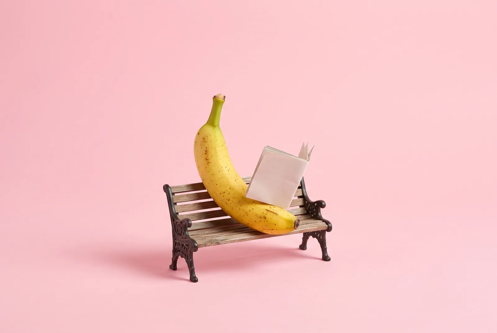 A banana on a tiny wooden bench reading a blank miniature newspaper, what real users say about NoFap