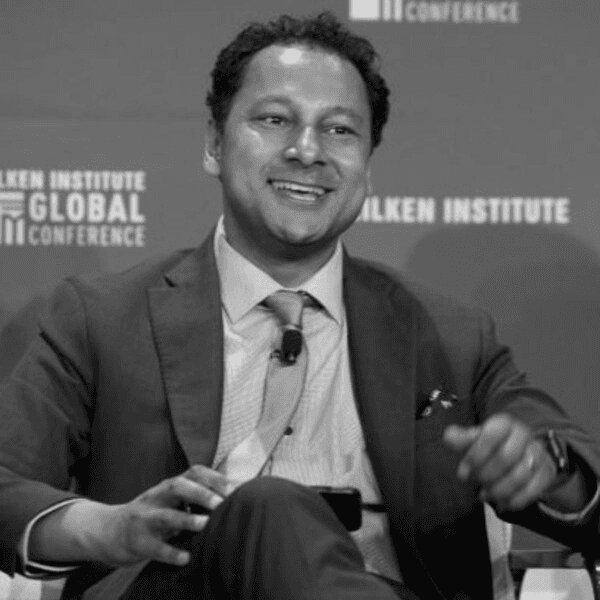 A professional headshot of a man