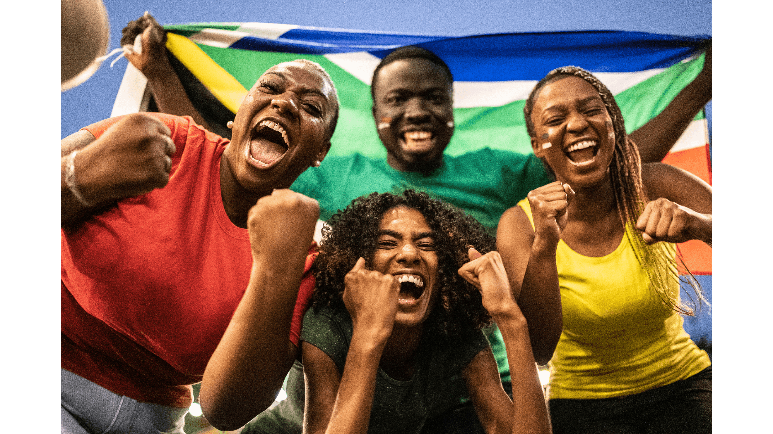 five children smiling while doing peace hand sign