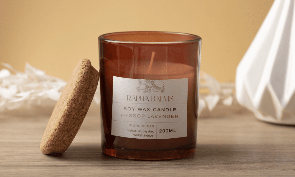 A candle with a label on it.