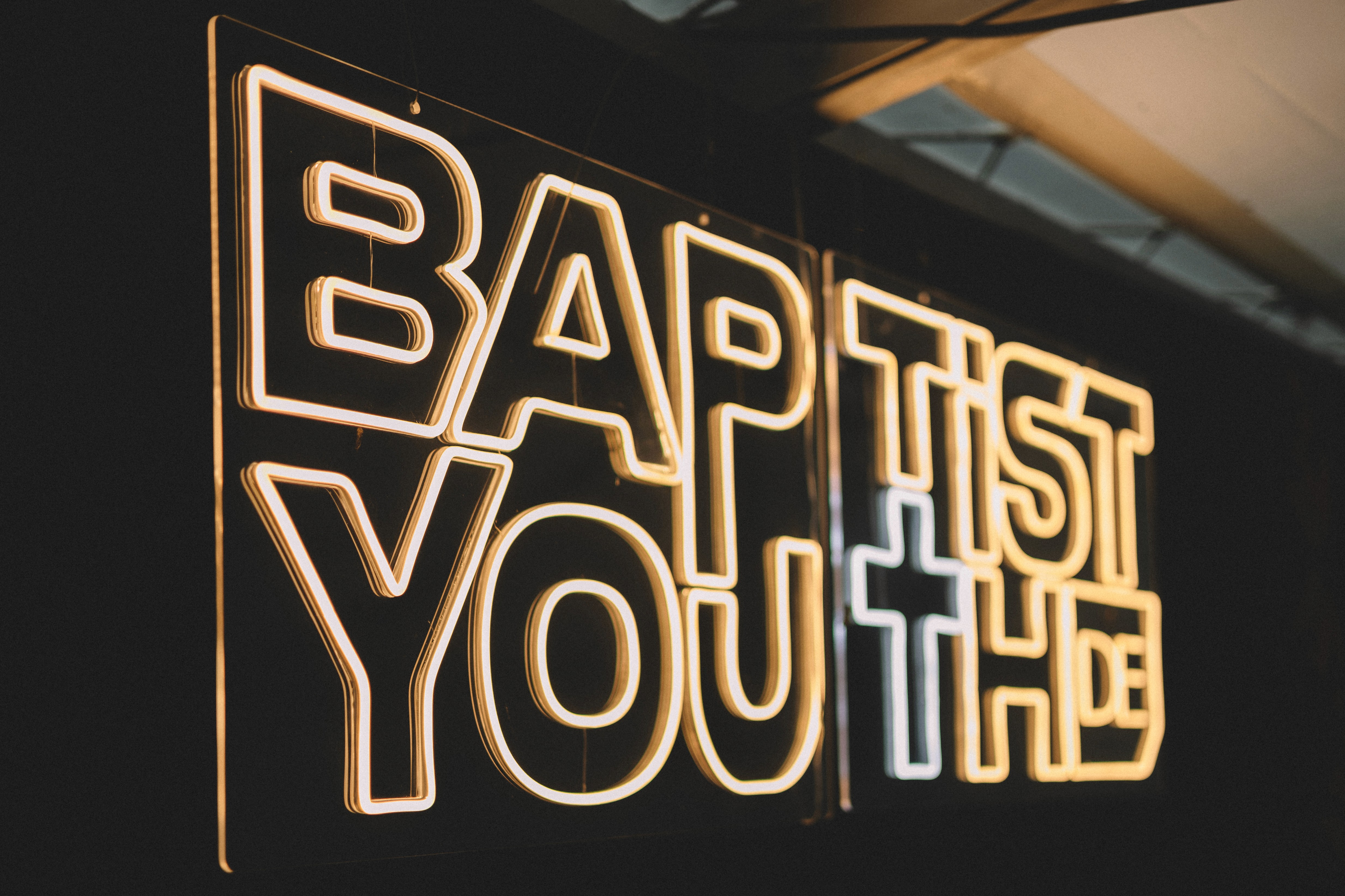 Modern sports supplement packaging tubes with bold typography and color-block design