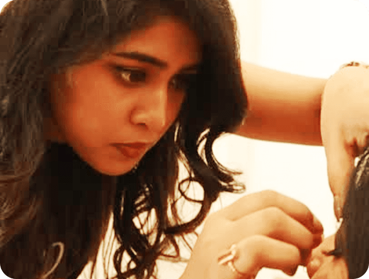 woman with pink and gold eyeshadow makeup