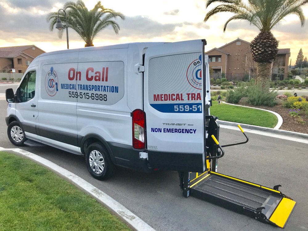 OnCall medical transport van parked at a Fresno medical clinic.