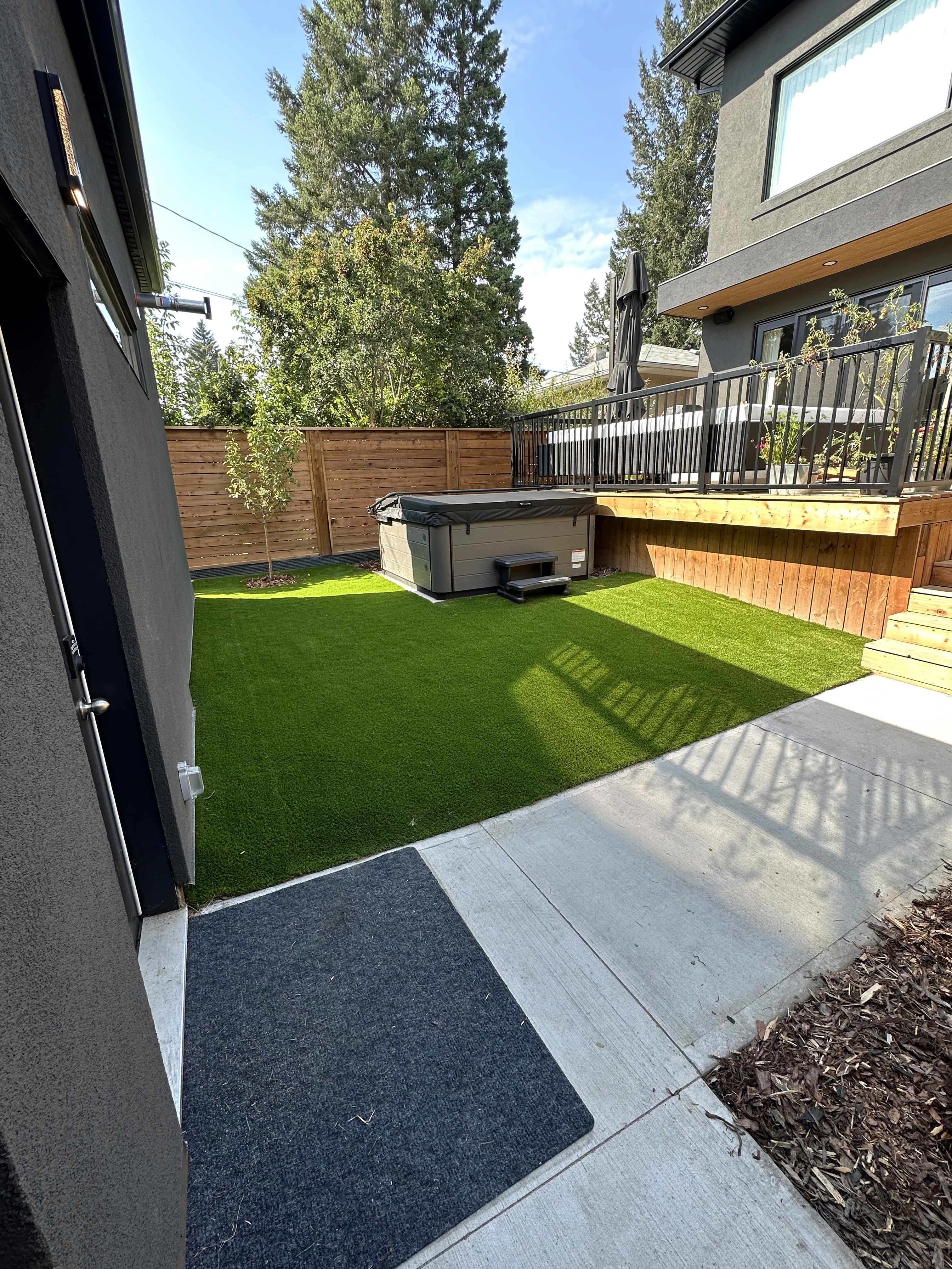 Beautiful landscaped garden with greenery and outdoor design elements.