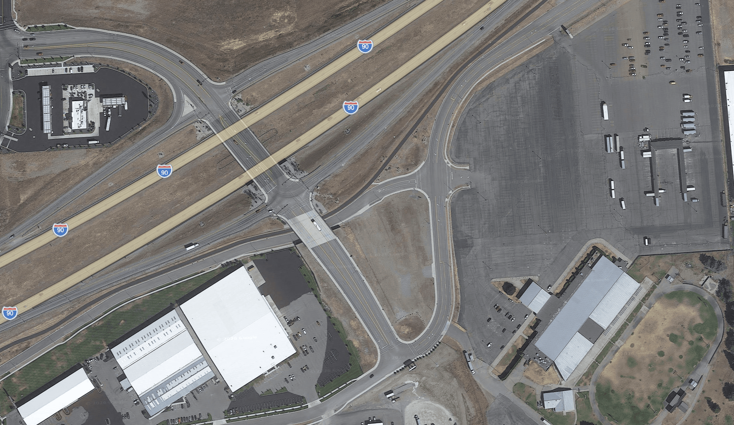 Aerial view of a highway truck stop and interchange