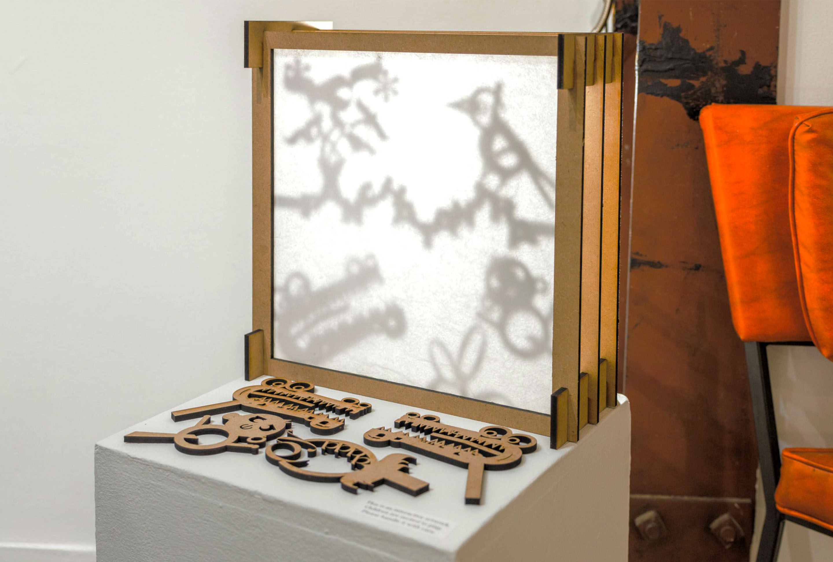 A mockup of a Macbook on a sofa