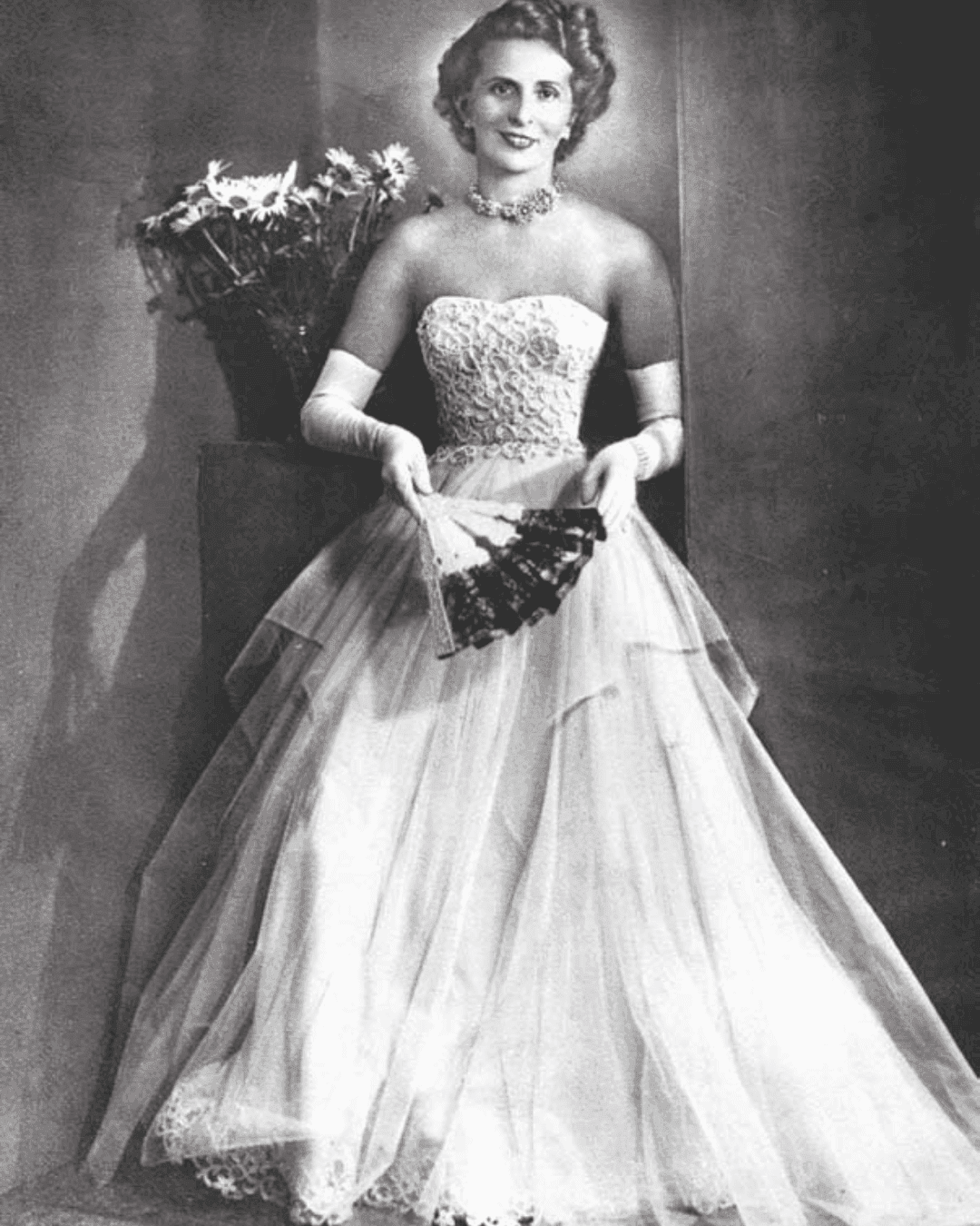 Princess Marcella Borghese wearing a Gattinoni design.