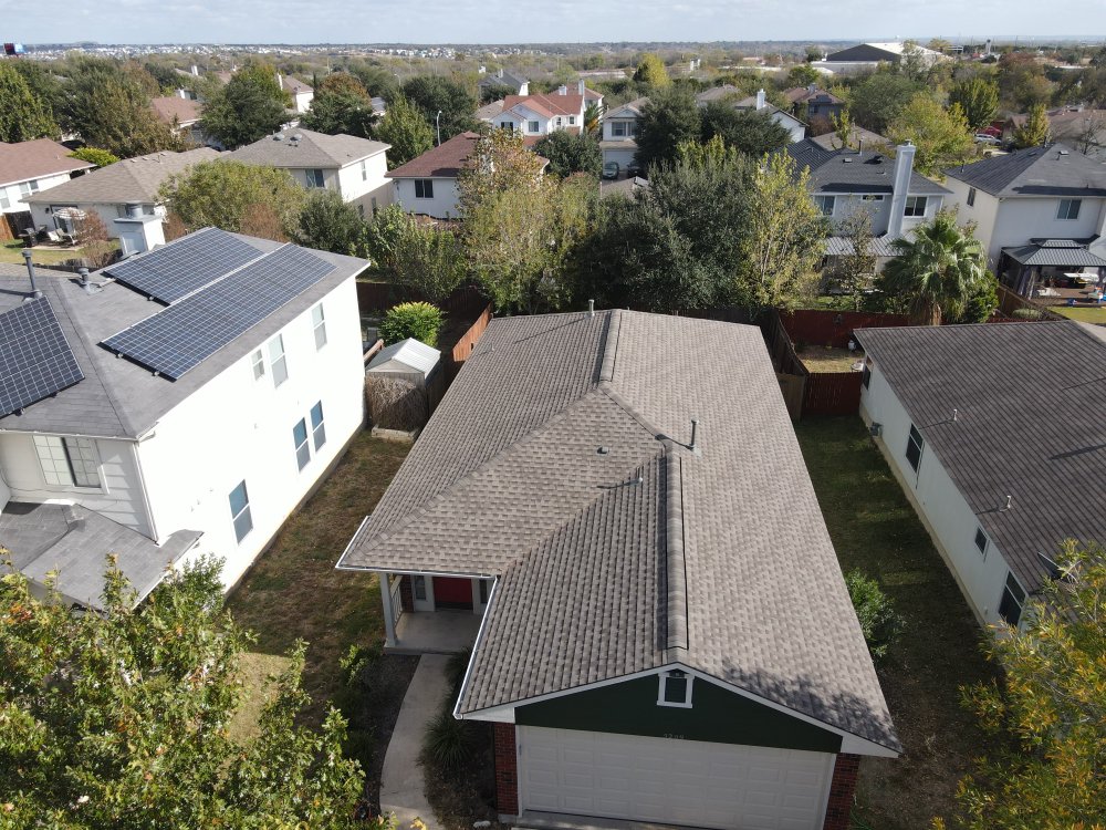 Beautiful fall-colored GAF HDZ architectural shingles complemented by a, combining vibrant aesthetics with durable protection