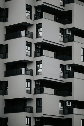Modern building with geometric balconies and windows