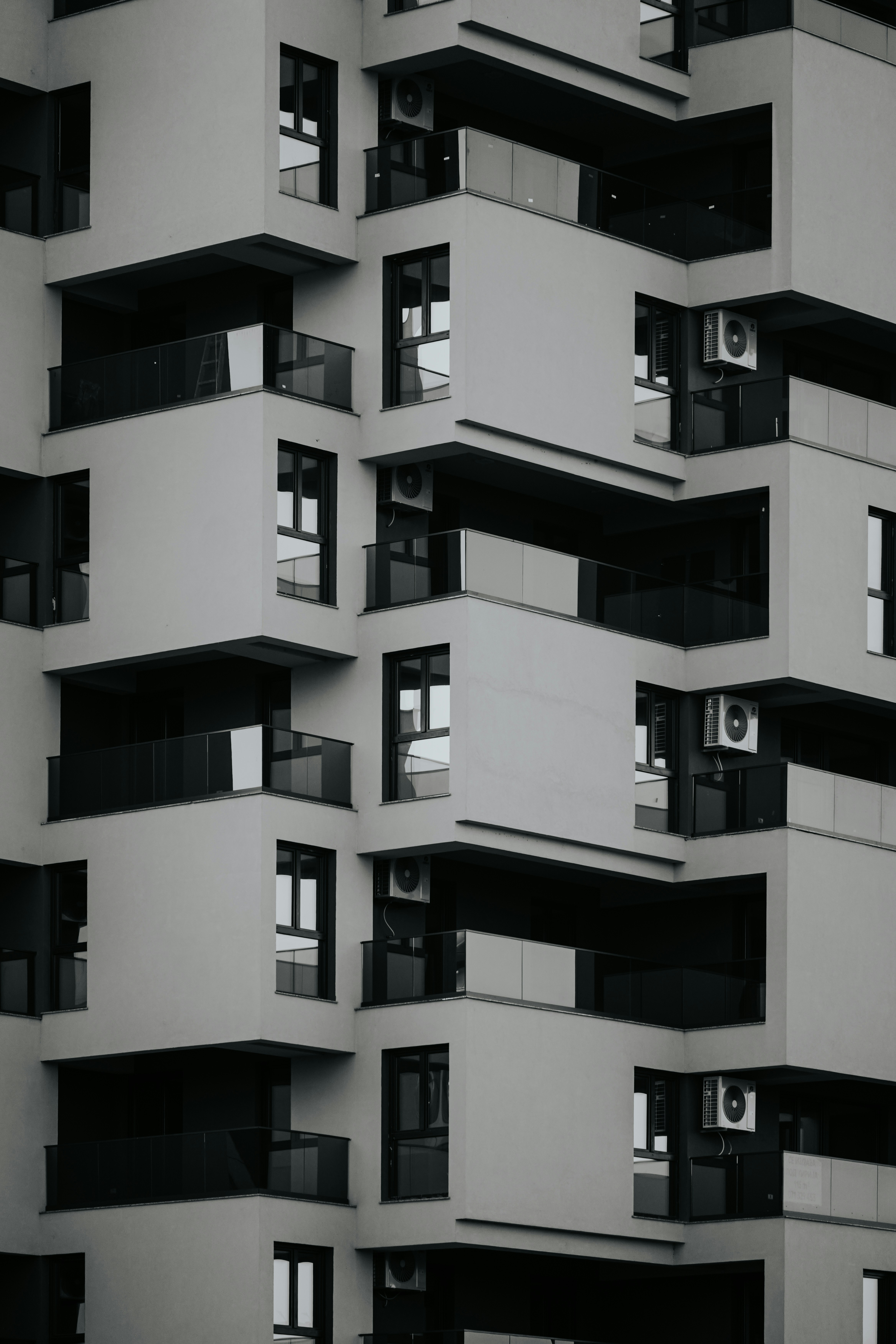 Modern building with geometric balconies and windows