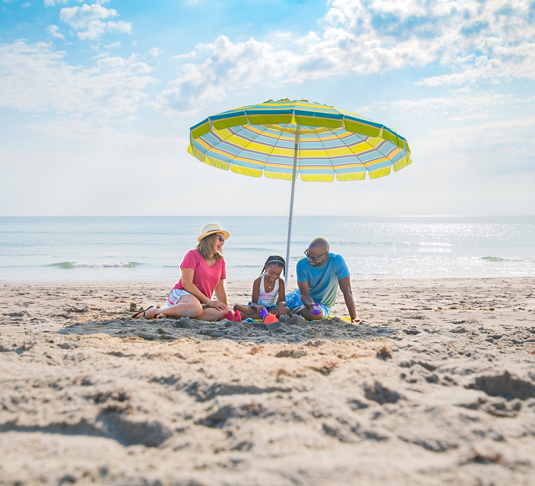 A family enjoying a day at the beach