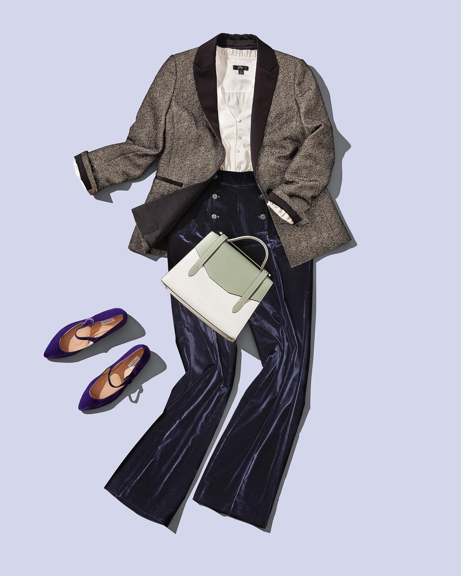 Fashionable outfit with tweed blazer, white blouse, velvet pants, mint handbag, and purple flats on light background.