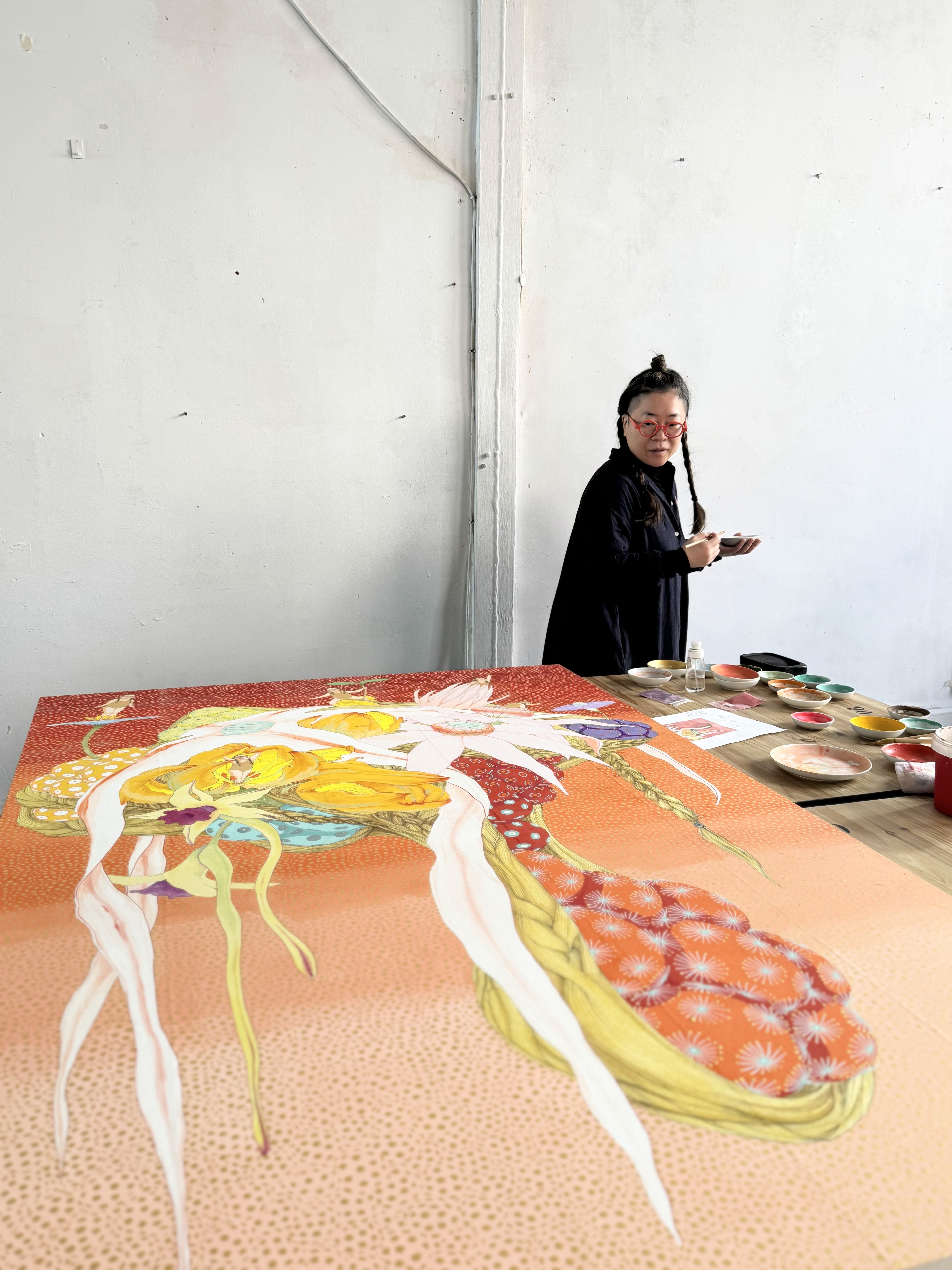 A formal oil painting of a man in a black coat, wearing a medal on his chest