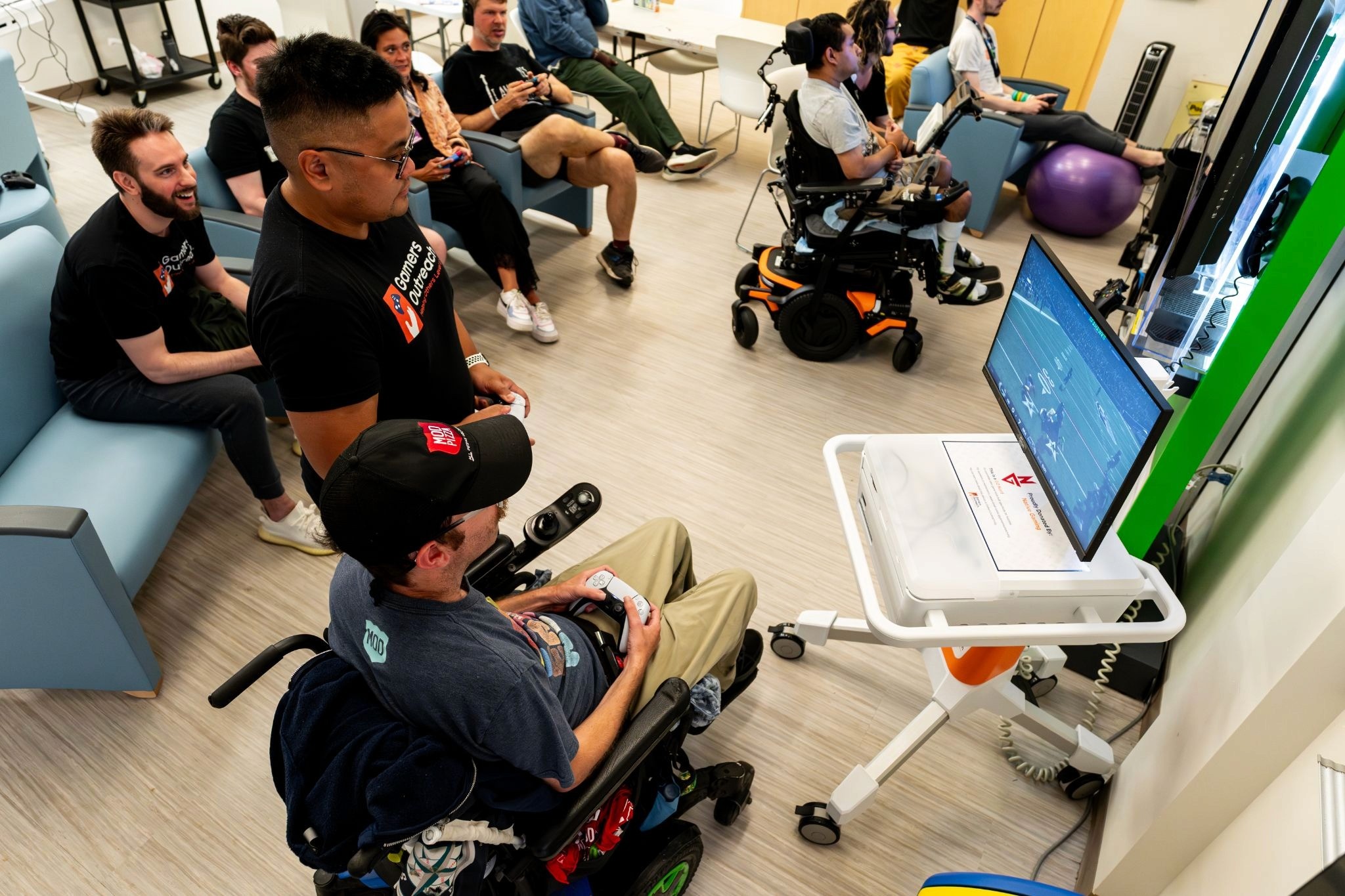 The Gamers Outreach staff playing with the Alyssa Burnett class attendees
