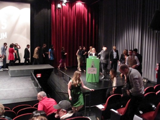 people are organising in the amphitheatre to giving speeches from the stage