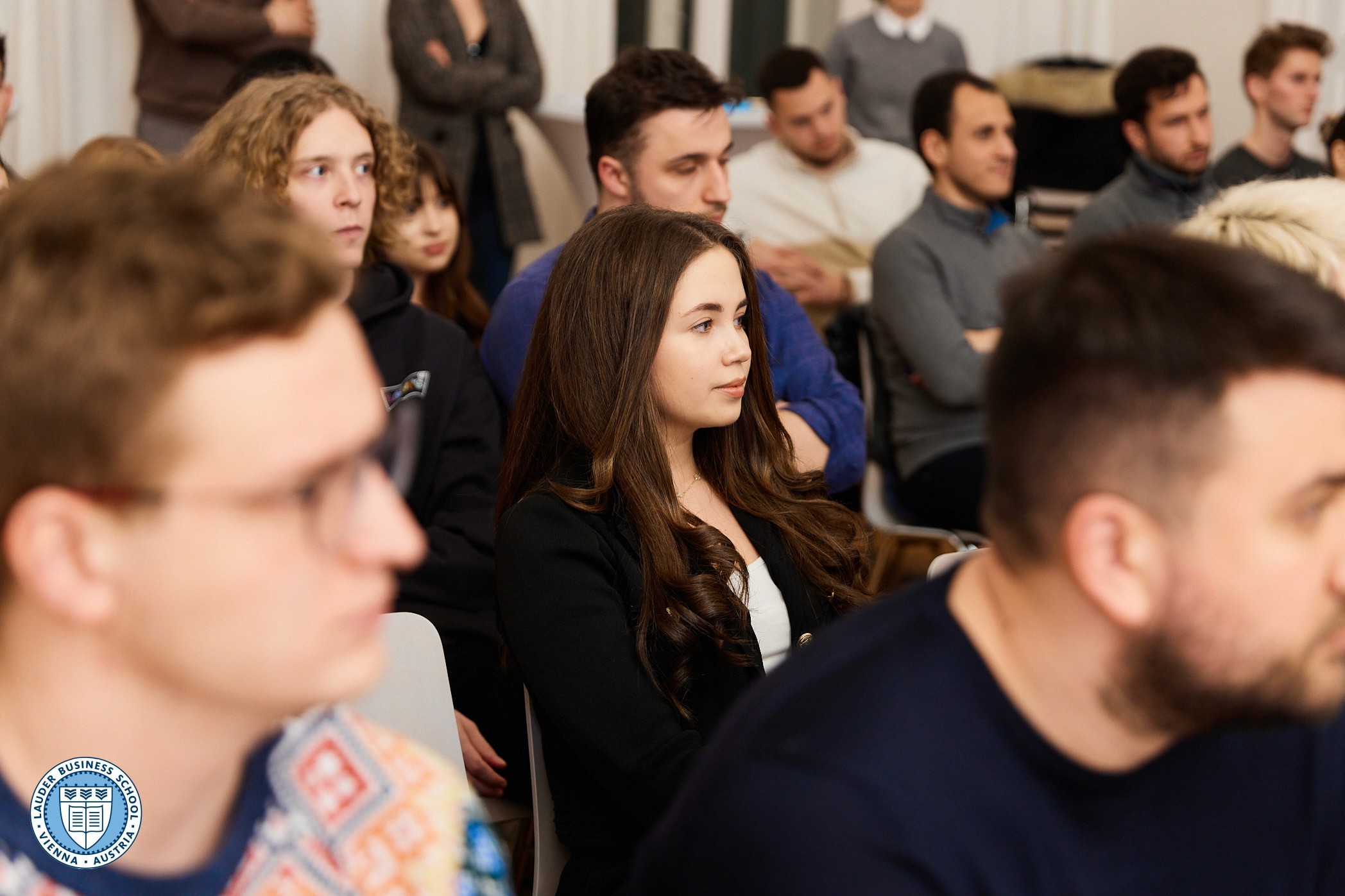 LBS students listening to  Adam Lessing, Ph.D., Head of Relationship Management at LGT Bank Österreich