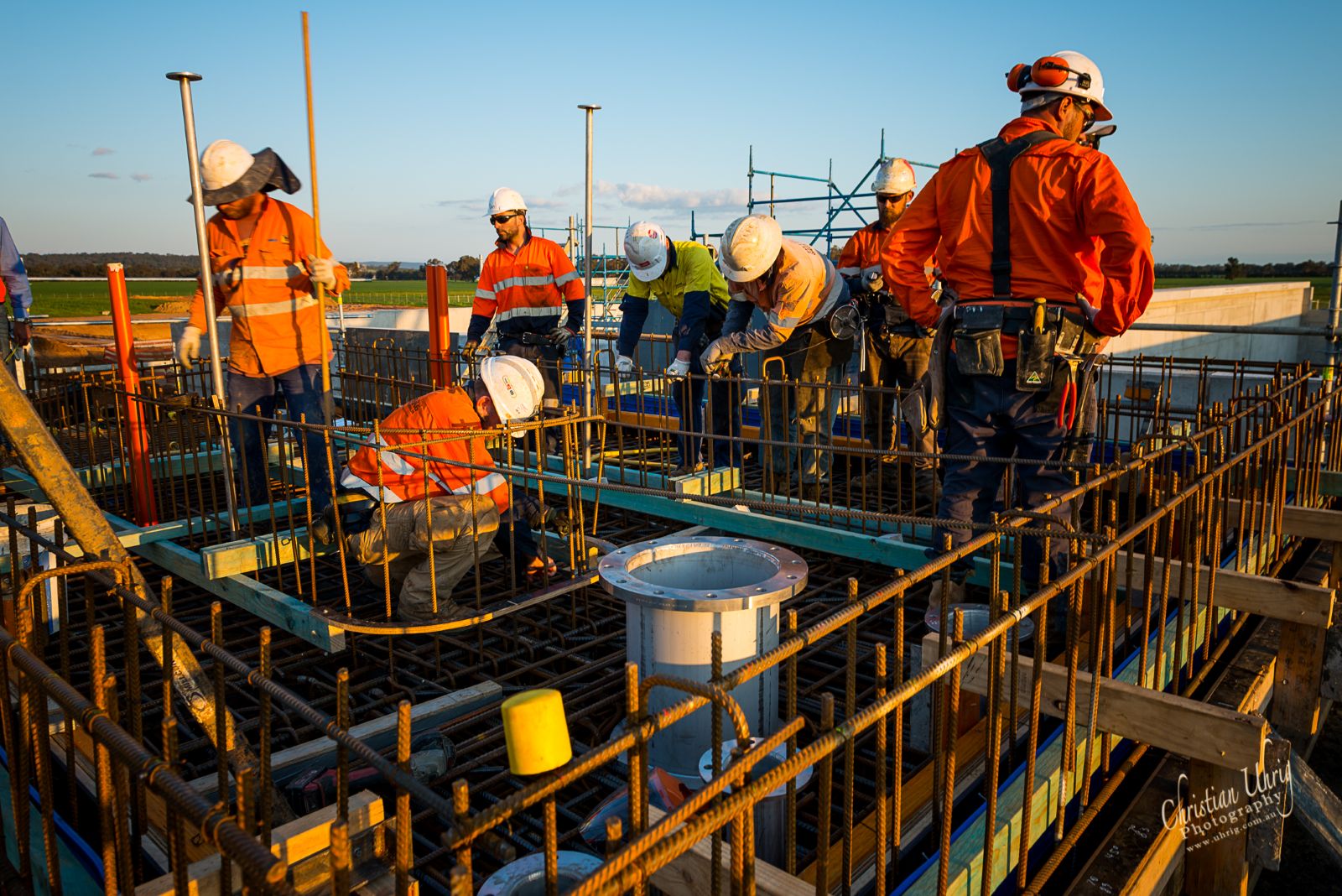Construction crews installing reinforced concrete and structural components on site during delivery of the Parkes Sewage Treatment Plant.