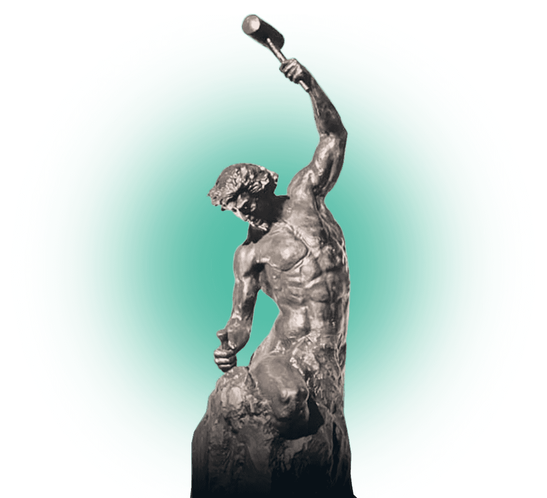 Statue of Man chiseling himself out of stone