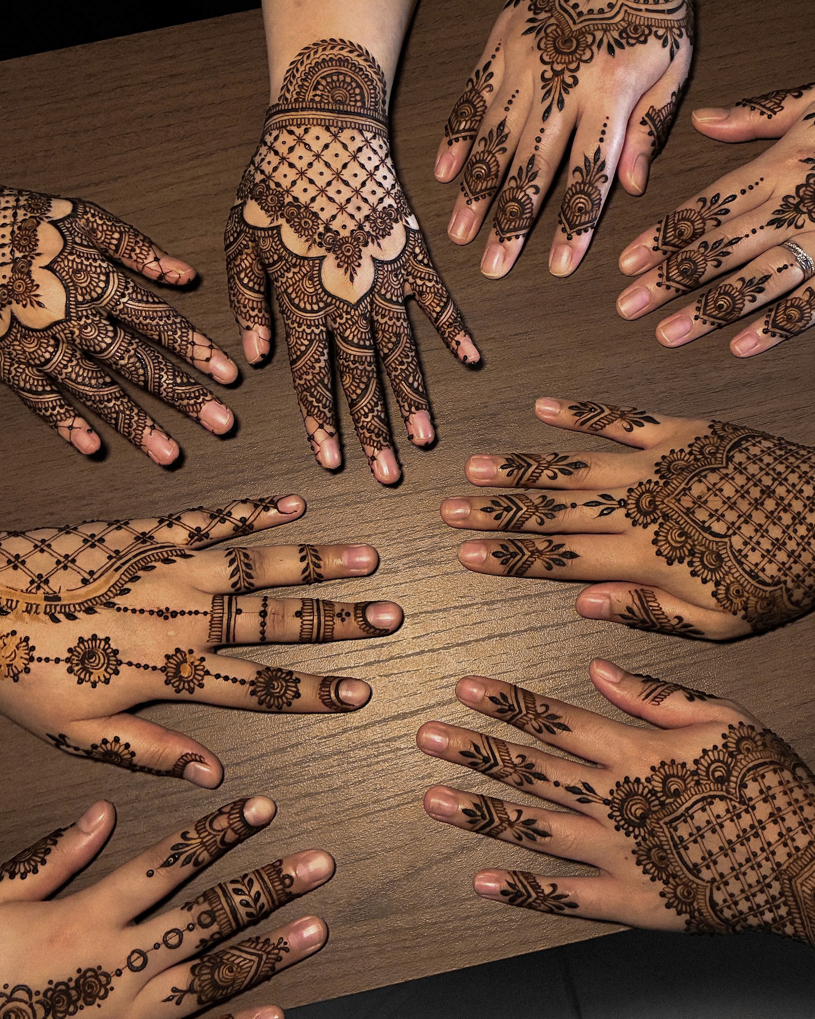 Group picture of henna done for guests at a henna party in Singapore.