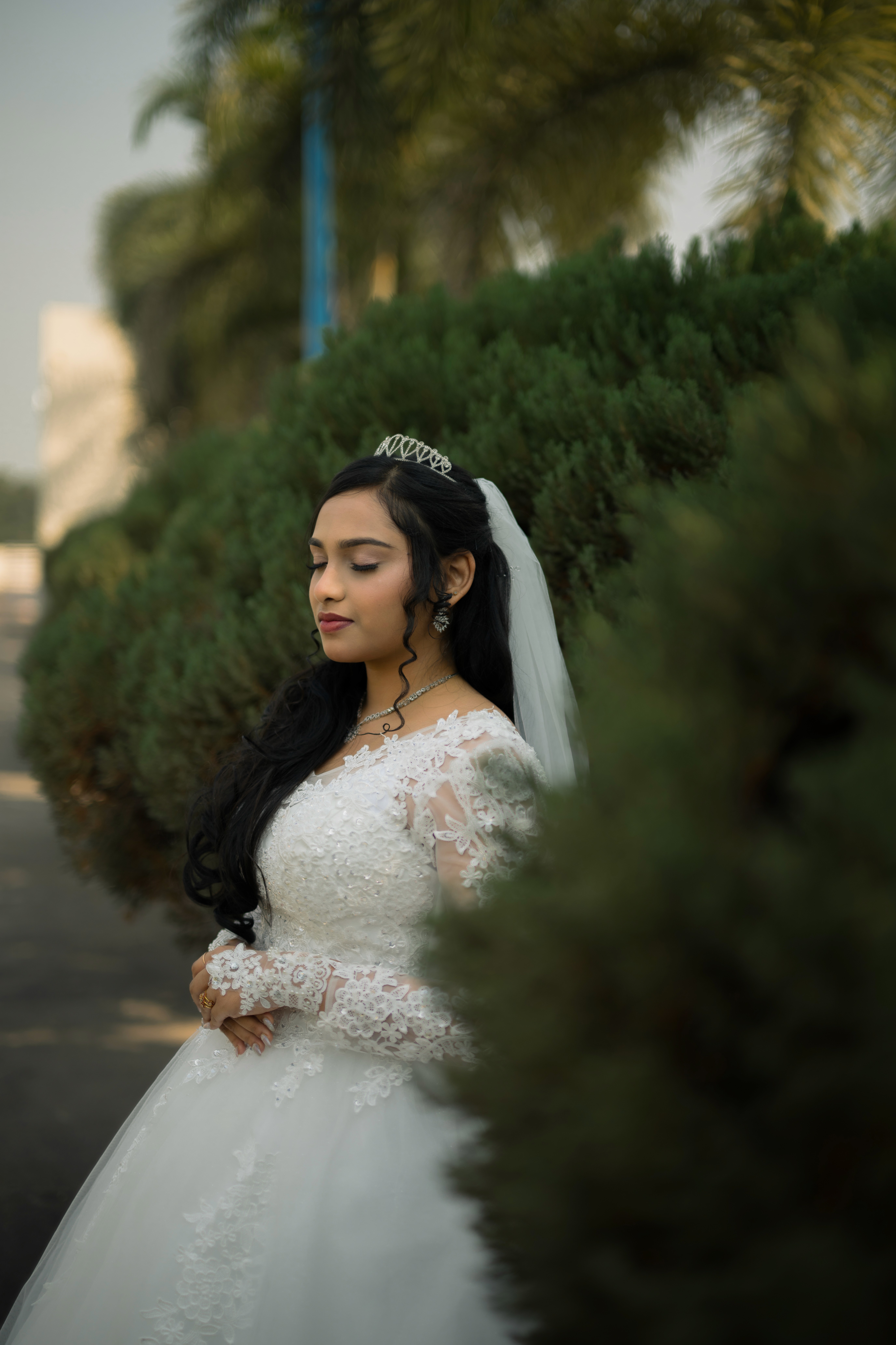 Christian wedding ceremony with bride in white gown and veil, photographed by Wow Makers wedding photography in Hyderabad, India.